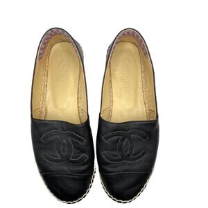 CHANEL Black Loafers with Iconic Quilted Design